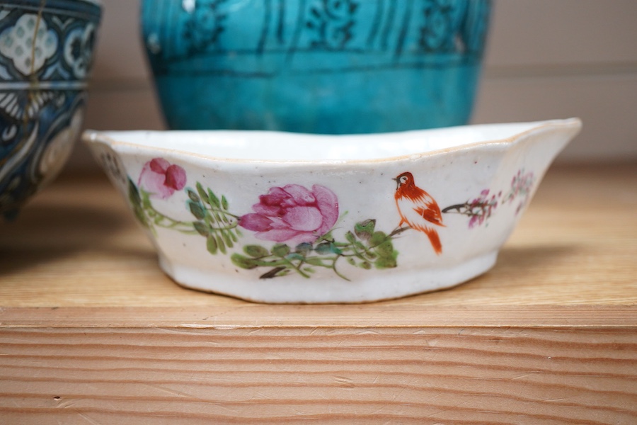 An early Persian pottery bowl and vase, a Japanese bowl and another Chinese segment dish, tallest 20cm